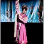 Chinese dancer performing on stage.